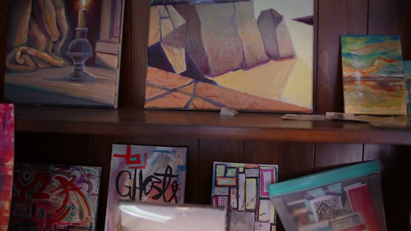 Paintings on display inside Phi Gallery.